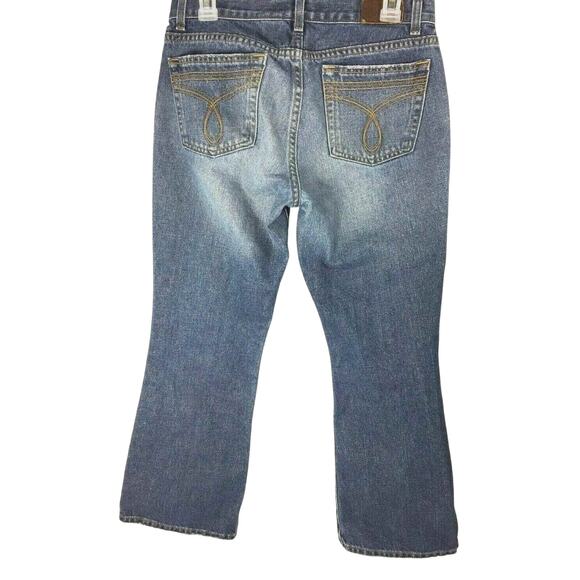 Calvin Klein Flare Jeans Womens Size 8 Medium Wash Denim Distress Mid Rise - Picture 2 of 11